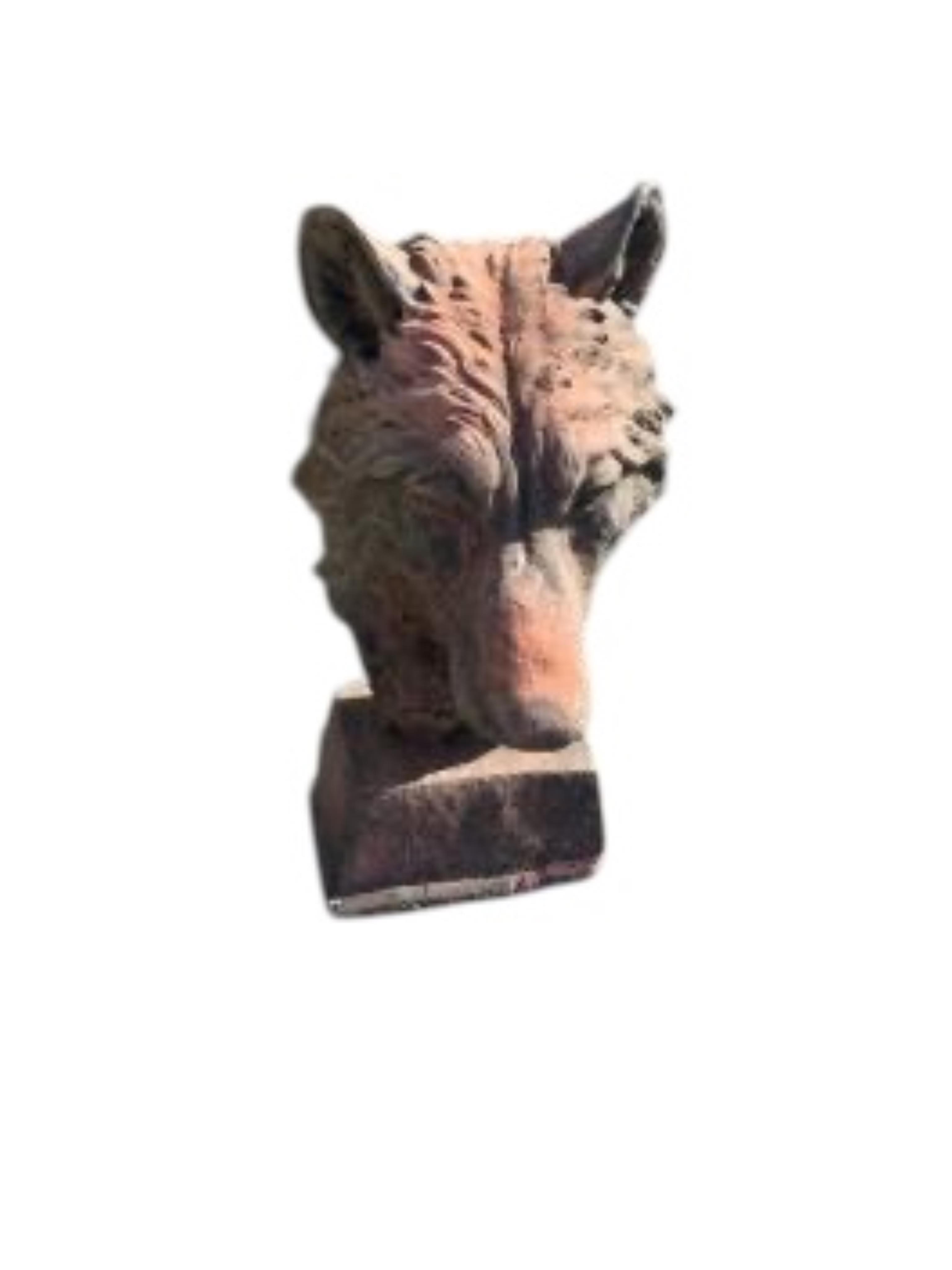 Four cast stone and terracotta garden busts, largest height 46cm